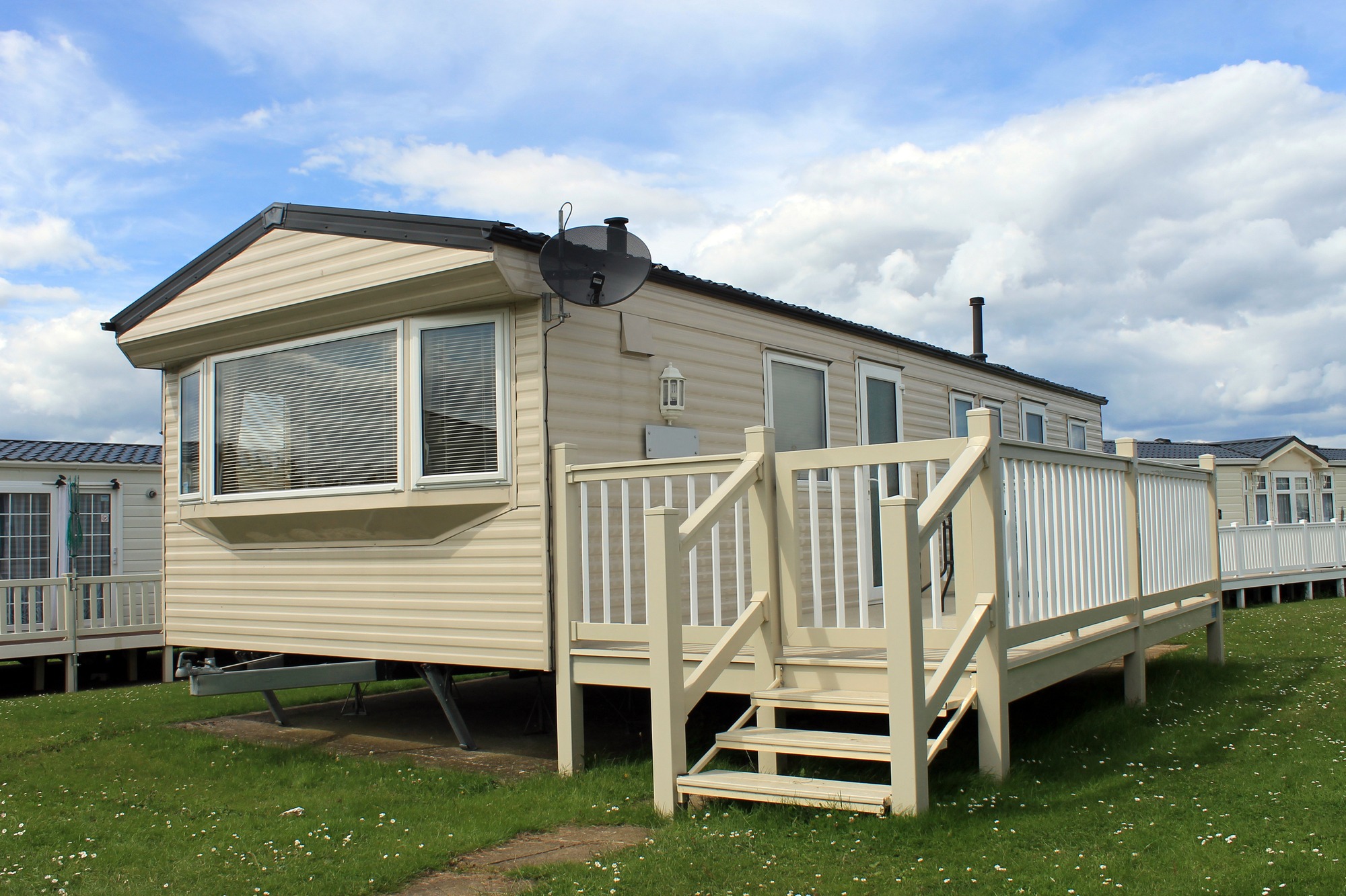 Mobile caravans or trailers in modern holiday park.